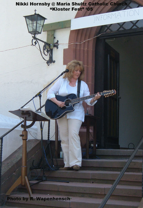 Nikki Hornsby in Europe playing a city festival solo
